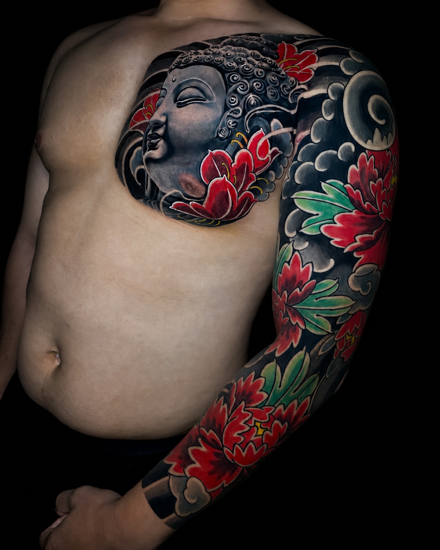 A fully healed Japanese-style shoulder and sleeve tattoo