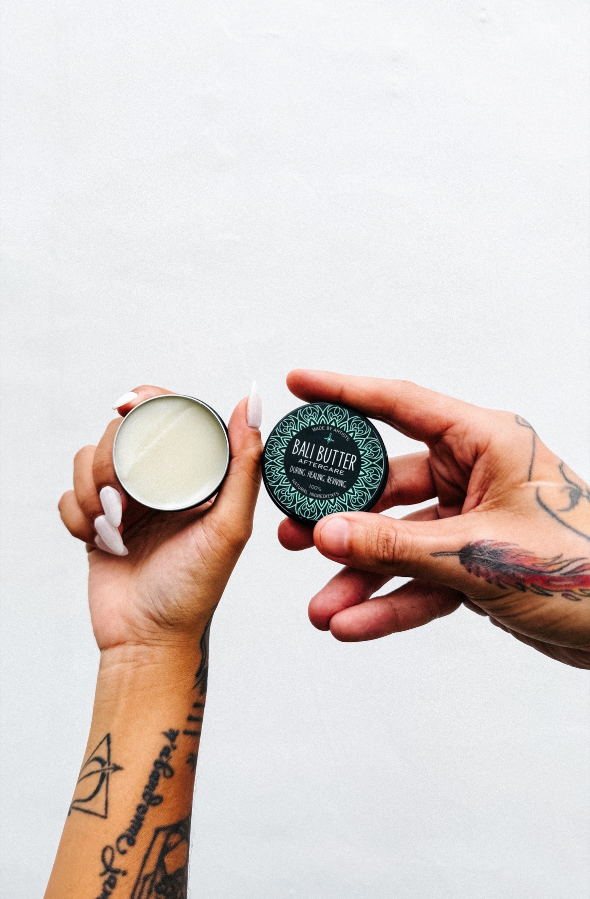 An open Bali Butter tattoo aftercare tin