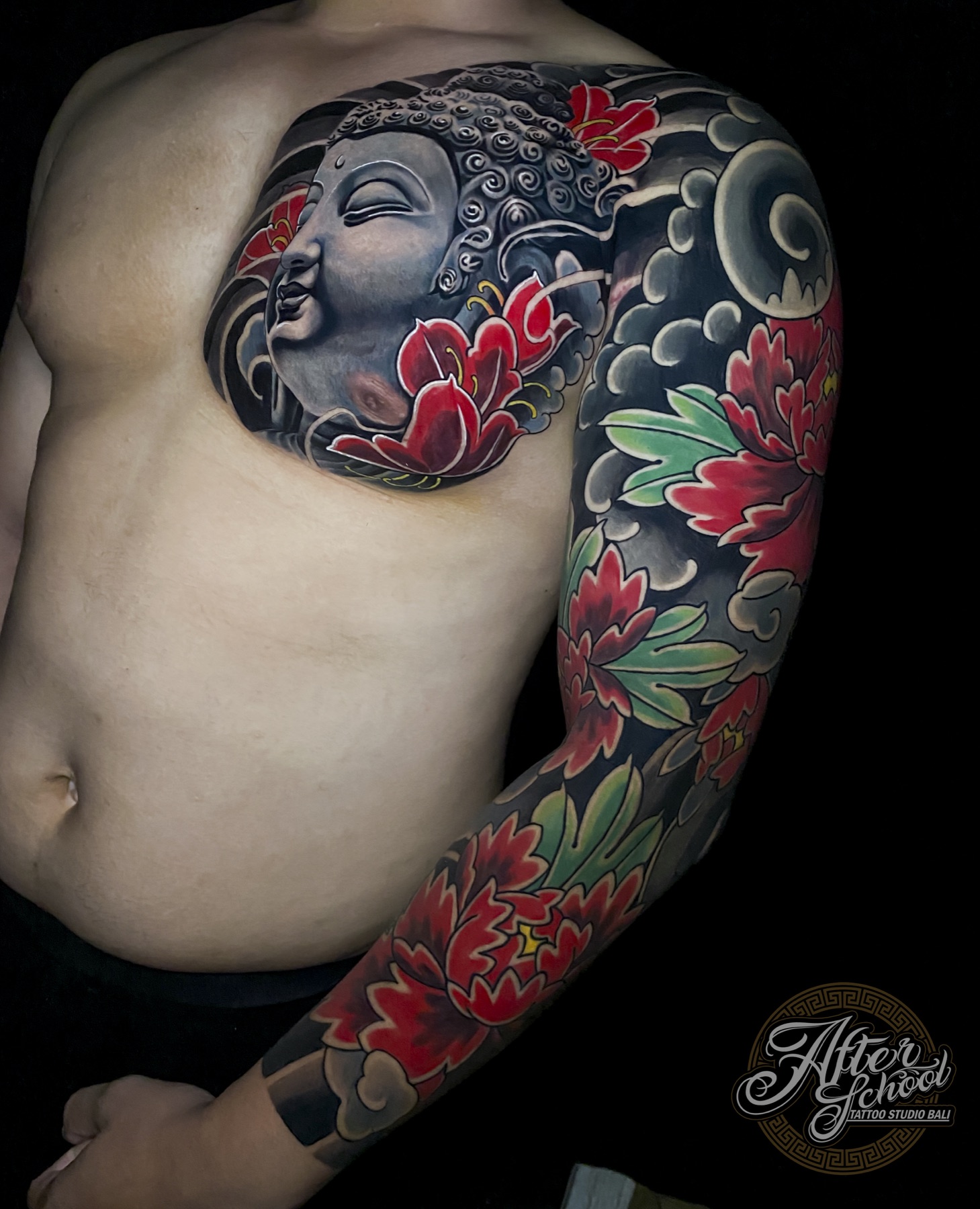 Fully healed Japanese-style Buddha shoulder and sleeve tattoo